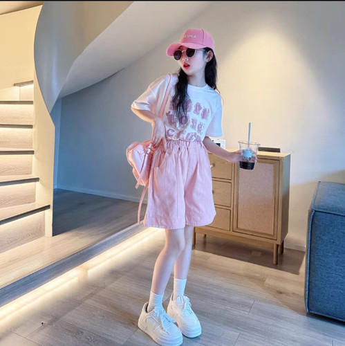 عکس محصول ست دو تیکه دخترانه وارداتی تی شرت سفید با شلوارک صورتی 5 تا 14 سال